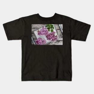 Fragrant purple Lilacs in a vase Kids T-Shirt